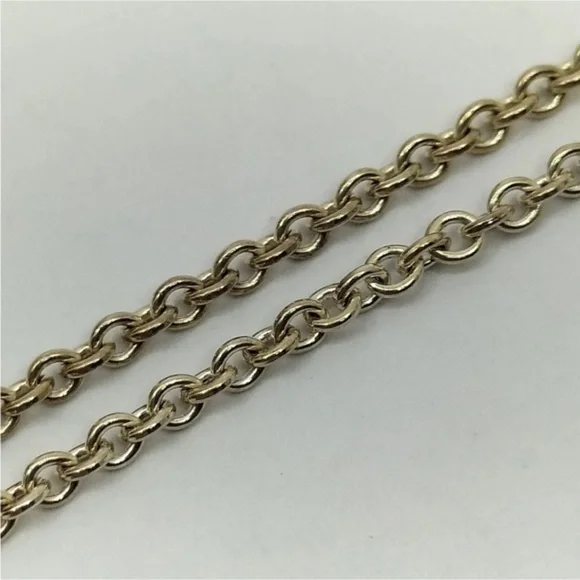 Tiffany & Co Silver Heart with 18kt Gold Ribbon Bow Necklace - Picture 5 of 11